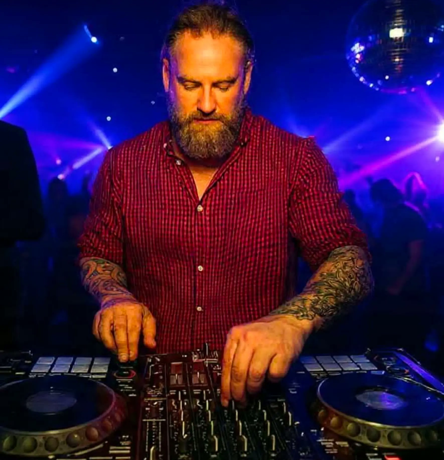 Zane, also known as DJ Z, performing behind the decks